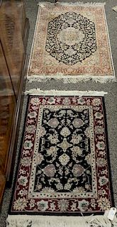 Two Oriental throw rugs (one silk). 2'6" x 4' and 2' x 3'.