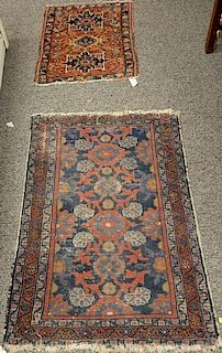 Two Oriental throw rugs. 2'6" x 3'9" and 1' x 2'6"