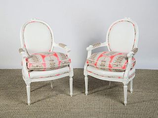 PAIR OF LOUIS XVI STYLE CARVED AND PAINTED CHAIRS