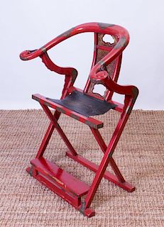 CHINESE BRASS-MOUNTED RED LACQUER HORSESHOE-BACK FOLDING CHAIR