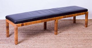 CANE-WRAPPED BENCH WITH BLACK VINYL CUSHION, IN THE STYLE OF DANNY HO FONG