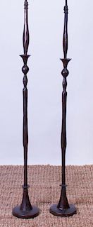 TWO BRONZE FLOOR LAMPS, IN THE STYLE OF ALBERTO GIACOMETTI