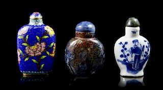 A Group of Three Snuff Bottles, Height overall of tallest 2 7/8 inches.