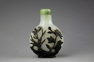Chinese black overlay mottled glass snuff bottle with jade stopper. Lotus on one side and Chrysanthemum on the reverse. 19th