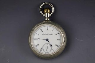Vintage Elgin National silver pocket watch with white dial and  black Roman numerals. No movements.