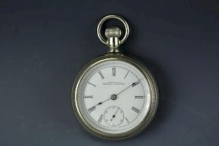Vintage Waltham silver pocket watch with white dial and  black Roman numerals. No movements.