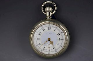 Vintage Elgin Silver pocket watch with white and blue dial, Arabic numerals and gilt hands. No movements