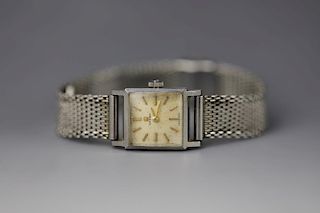 Vintage Omega watch with crystal, stainless steel case and band. Good movements