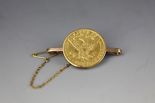 1901  $10 Liberty head gold coin on 10k brooch and chain.