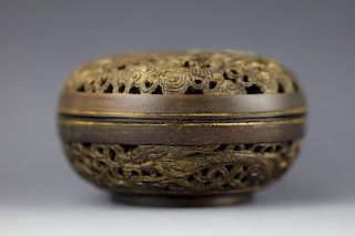 Chinese carved rosewood circular box and cover with Qianlong mark on mother of pearl plaque.