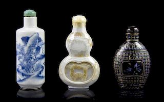 A Group of Three Snuff Bottles, Height of first overall 2 5/8 inches.
