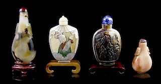 A Group of Four Snuff Bottles, Height of tallest 3 1/4 inches.