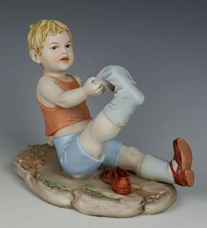 Capodimonte Benacchio Figurine "Boy Pulling Sock"