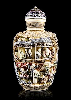 A Polychrome Decorated Ivory Snuff Bottle, Height overall 3 1/2 inches.