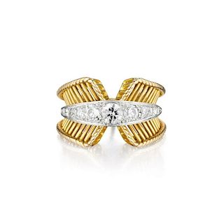 A Platinum and 18K Gold Diamond Ring