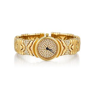 An 18K Gold Diamond Bangle Watch