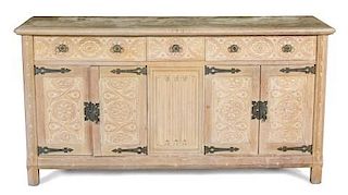 A Gothic Style Pine Sideboard Height 37 1/2 x width 71 x depth 22 inches.