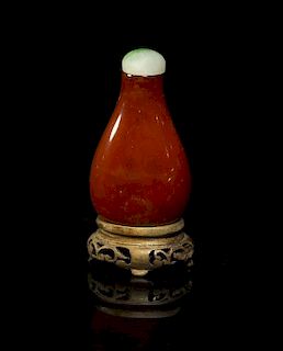 An Amber Snuff Bottle, Height 2 1/4 inches.