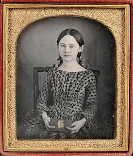 Sixth-plate Tinted Daguerreotype of a Seated Girl Holding a Book