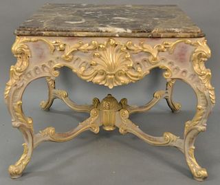 Large Continental French style marble top center table with shell carved skirt. ht. 33 1/2in., top: 40" x 40"
