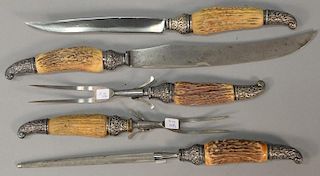 Five piece bone and silver carving set, having sterling handles.