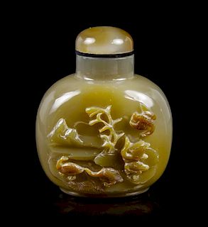 A Carved Agate Snuff Bottle, Height overall 2 5/8 inches.