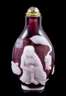 A Peking Glass Snuff Bottle, Height 2 7/8 inches.
