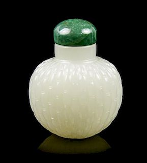 A White Jade Snuff Bottle, Height 1 7/8 inches.