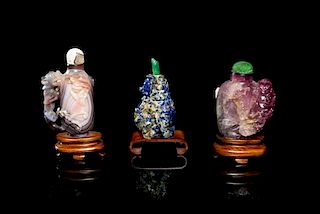 Three Carved Snuff Bottles, Height of tallest overall 2 5/8 inches.