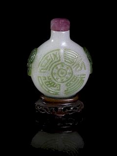 A Peking Glass Snuff Bottle, Height 2 1/4 inches.