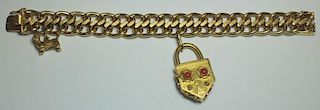 JEWELRY. 14kt Gold Link Bracelet with (2) Charms.