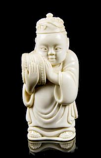 A Carved Ivory Figural Snuff Bottle, Height overall 2 7/8 inches.
