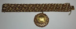 JEWELRY. Heavy 14kt Gold Woven Bracelet and Charm.