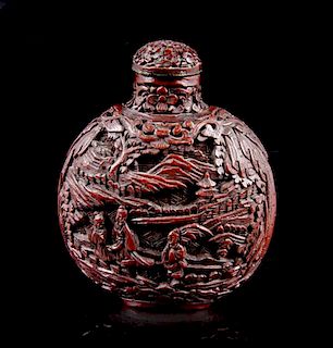 A Carved Cinnabar Lacquer Snuff Bottle, Height overall 3 1/2 inches.