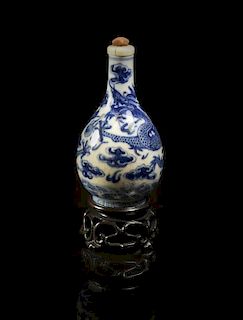 A Blue and White Porcelain Snuff Bottle, Height 3 1/2 inches.