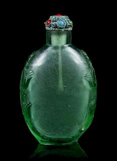 A Carved Glass Snuff Bottle, Height 2 5/8 inches.