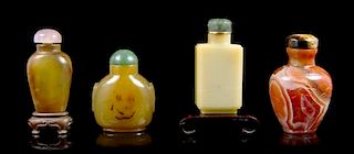 A Group of Four Agate Snuff Bottles, Height of tallest 2 1/4 inches.