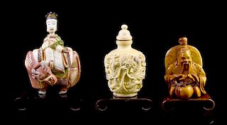 Three Carved Ivory Snuff Bottles, Height of tallest overall 3 1/8 inches.