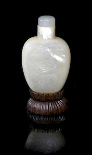 A Carved Opal Snuff Bottle, Height 2 1/4 inches.