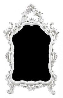A Rococo Style White Plaster Mirror, Height 54 3/4 x width 34 inches.
