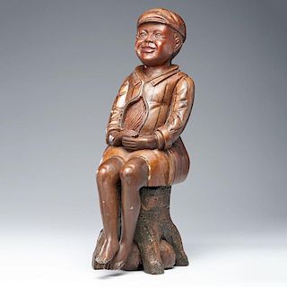 Folk Art Sculpture of a Seated Boy