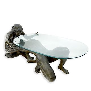 A Bronze Art Deco style Female and Male Nude Figural Glass Top Coffee Table