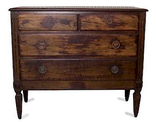 A Louis XVI Provincial Style Mahogany Chest of Drawers Height 36 x width 46 inches.