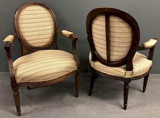 Pair of French Louis XVI Walnut Open Armchairs