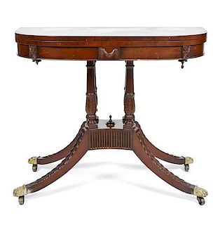 A Federal Style Mahogany Game Table, Height 29 1/2 x width 36 x depth 17 3/4 inches (closed).