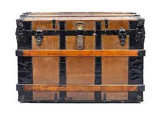 A Vintage Canvas, Oak and Metal Banded Steamer Trunk, Height 22 x width 38 1/4 x depth 23 1/4 inches.