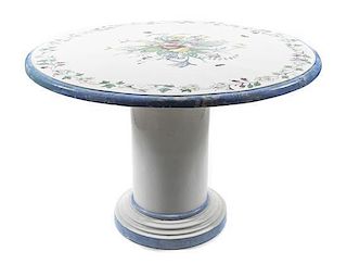 A Continental Style Painted Ceramic Occasional Table, Height 32 x diameter 48 inches.