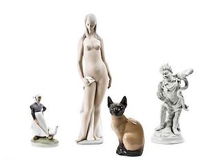 A Collection of Four Porcelain Figures, Height of tallest 18 inches.