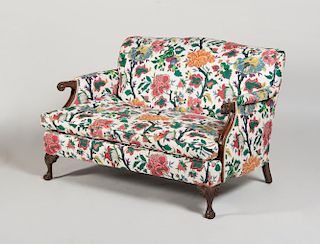 GEORGE III STYLE CARVED MAHOGANY AND COTTON-UPHOLSTERED SOFA