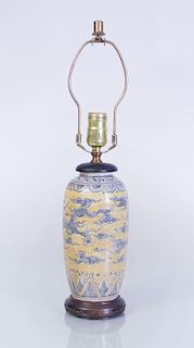 CHINESE IRON RED GLAZED POTTERY VASE MOUNTED AS A LAMP AND A YELLOW AND BLUE GLAZED POTTERY VASE MOUNTED AS A LAMP